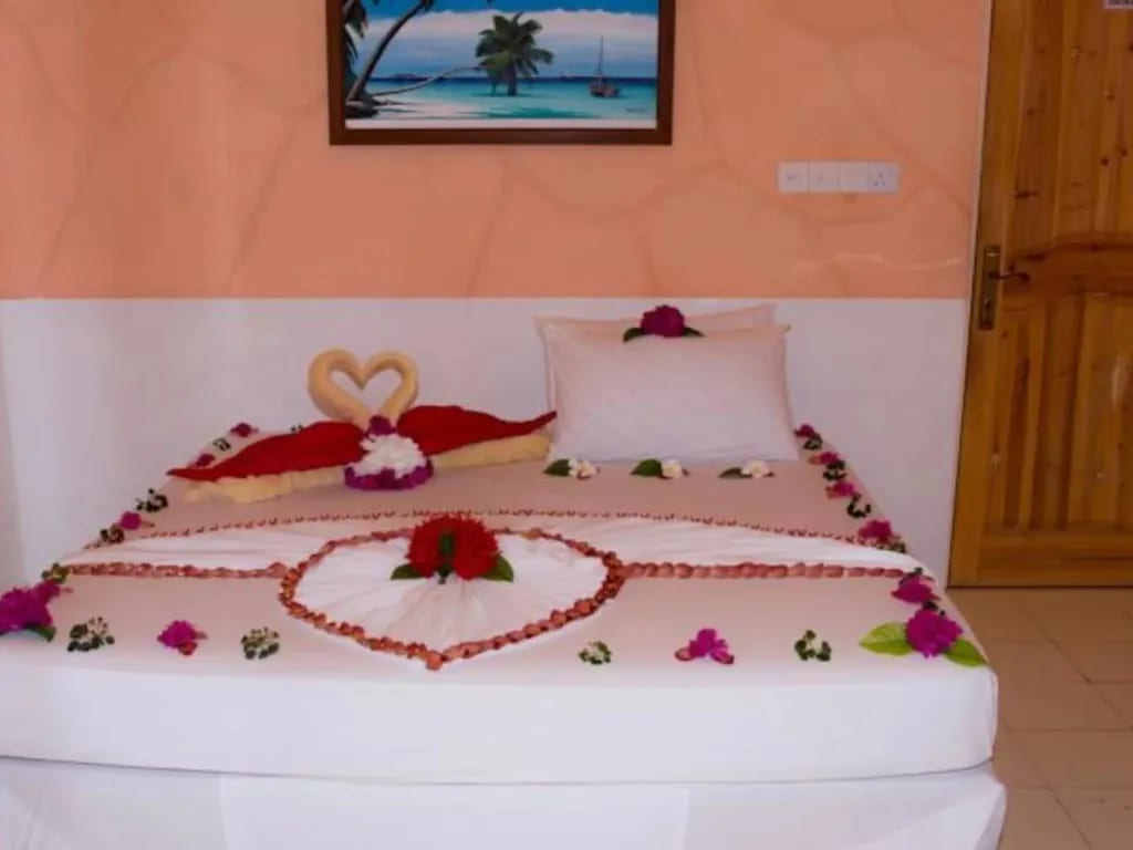 Rasdhoo Island Inn · On the designated beach · sunset side