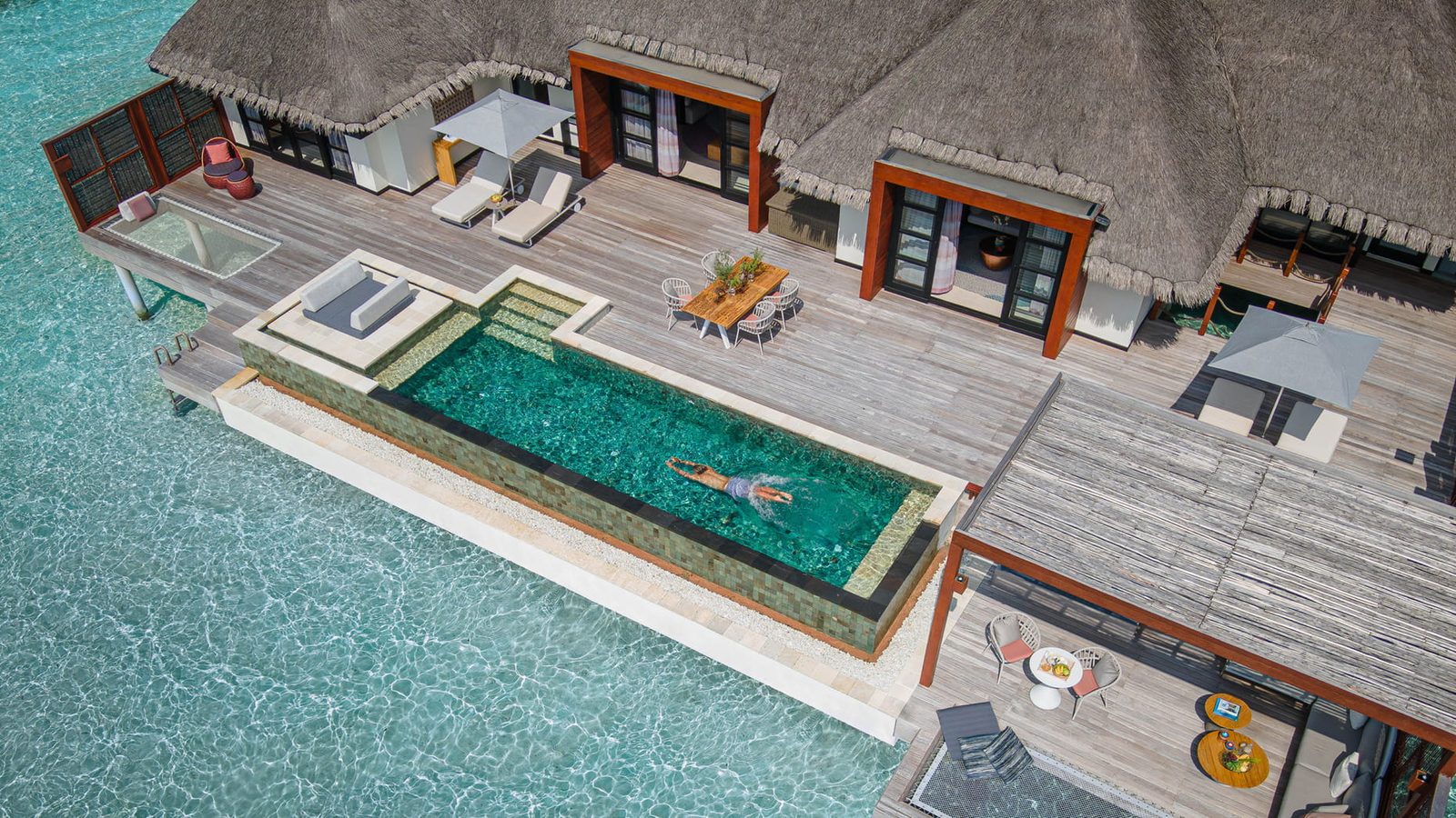 Sunset Two Bedroom Water Suite · Two bedrooms · sunset over-water