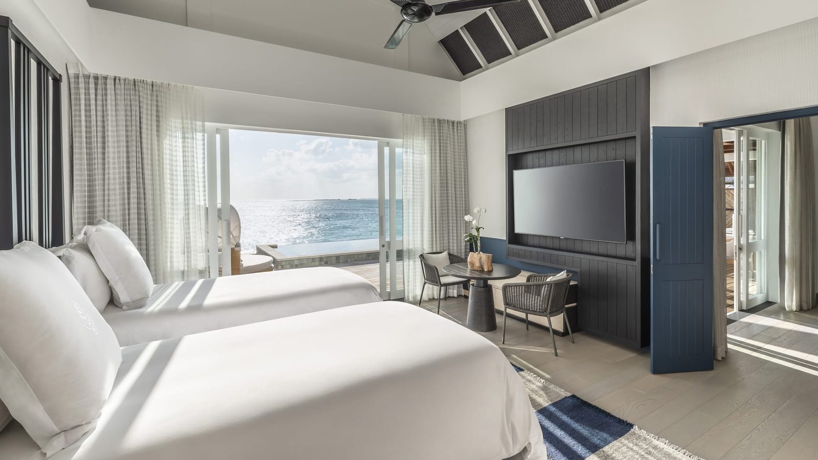Sunset Two-Bedroom Water Suite · Two bedrooms · sunset over-water